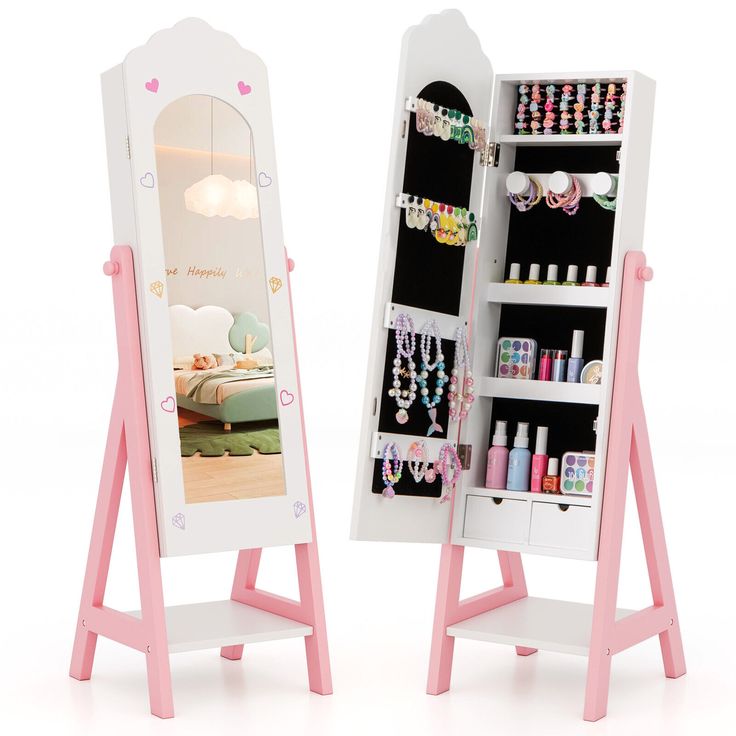 a white and pink doll's dressing table with a mirror