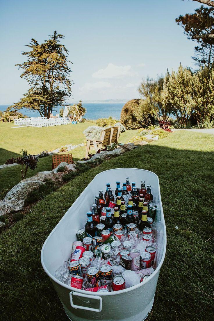 Bath filled with alcohol outdoors on wedding day in Cornwall Wedding Drink Buckets, Drinks Display Wedding, Drinking Wedding Ideas, Diy Drinks Wedding, Diy Wedding Alcohol, Drinks Outdoor Wedding, Diy Wedding Bar Self Serve Alcohol, Drink Cooler Wedding, Wedding Drink Cooler Ideas