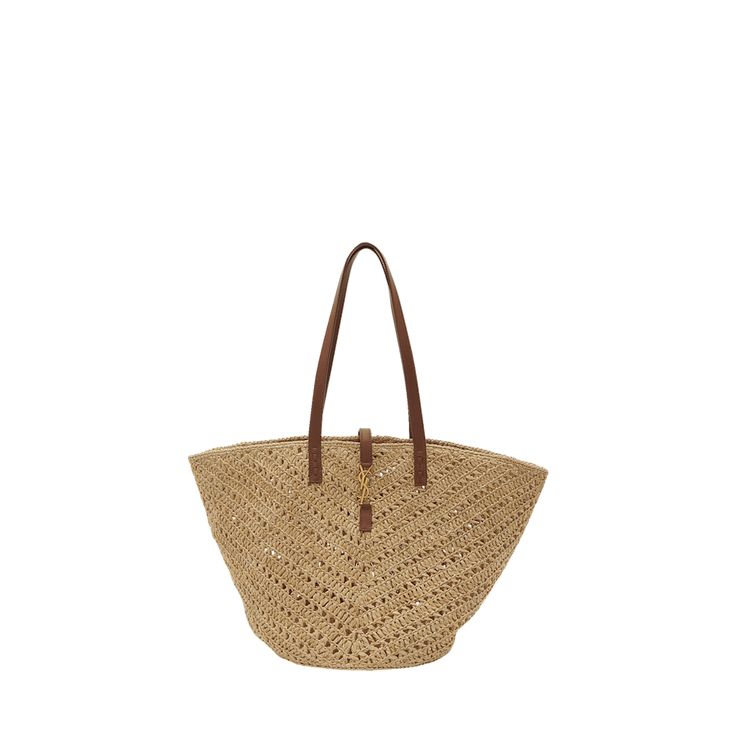 Saint Laurent "Panier" tote bag in raffia  Flat shoulder straps  Golden hardware Open top with center YSL strap  Structured bottom of bag  Approx. 8.3"H x 17.3"W x 7.9D Imported Ysl Tote Bag, Ysl Tote, Open Top, Bergdorf Goodman, Shoulder Straps, Saint Laurent, Tops Designs, Tote Bag, Luxury Fashion