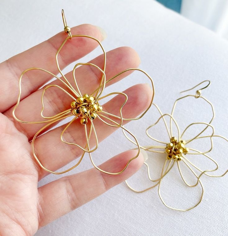 Flower Statement Earrings Handworked Modern Floral Giant Daisy Jewelry Handmade Large Wire Earrings - Etsy Spring Festival Metal Earrings For Gifts, Spring Gift Earrings In Metal, Spring Festival Gift Earrings In Metal, Rose Gold Flower-shaped Metal Earrings, Gold Flower Earrings Spring Gift, Gold Flower Earrings For Spring Gift, Spring Gold Metal Flower Earrings, Gold Flower-shaped Earrings For Spring, Gold Flower-shaped Nickel-free Hoop Earrings