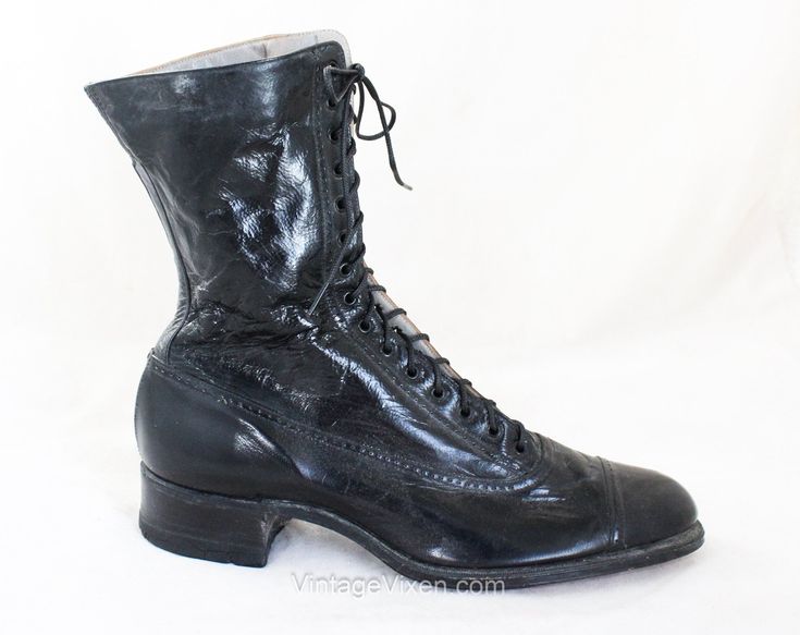 "Victorian lace-up boots in fine black leather, an iconic pair of antique shoes in a curvy silhouette with toe cap, subtle broguing, and a sturdy sole.  These authentic Victorian ladies' boots have a 1.25-inch heel in stacked painted wood, tapered toes and high lacing to lower calf.  So unusual to find in unworn condition, with the original stamped leather logo to the soles.  An exceptional antique boot!    Size   Marked 3.5    Measurements   Ball of Foot Width 3 1/8, Toe to Heel 9 7/8 Inches  S Historical Formal Boots With Leather Sole, Vintage Fitted Lace-up Boots With Snip Toe, Victorian Boots With Leather Sole For Formal Wear, Victorian Formal Boots With Leather Sole, Formal Victorian Boots With Leather Sole, Victorian Almond Toe Fitted Boots, Vintage Lace-up Boots With Cap Toe And Leather Sole, Vintage Lace-up Cap Toe Boots With Leather Sole, Formal Lace-up Boots With Closed Toe