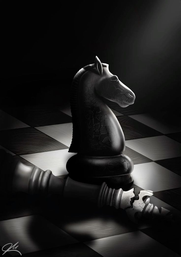 a black and white photo of a chess board with a horse head on the top