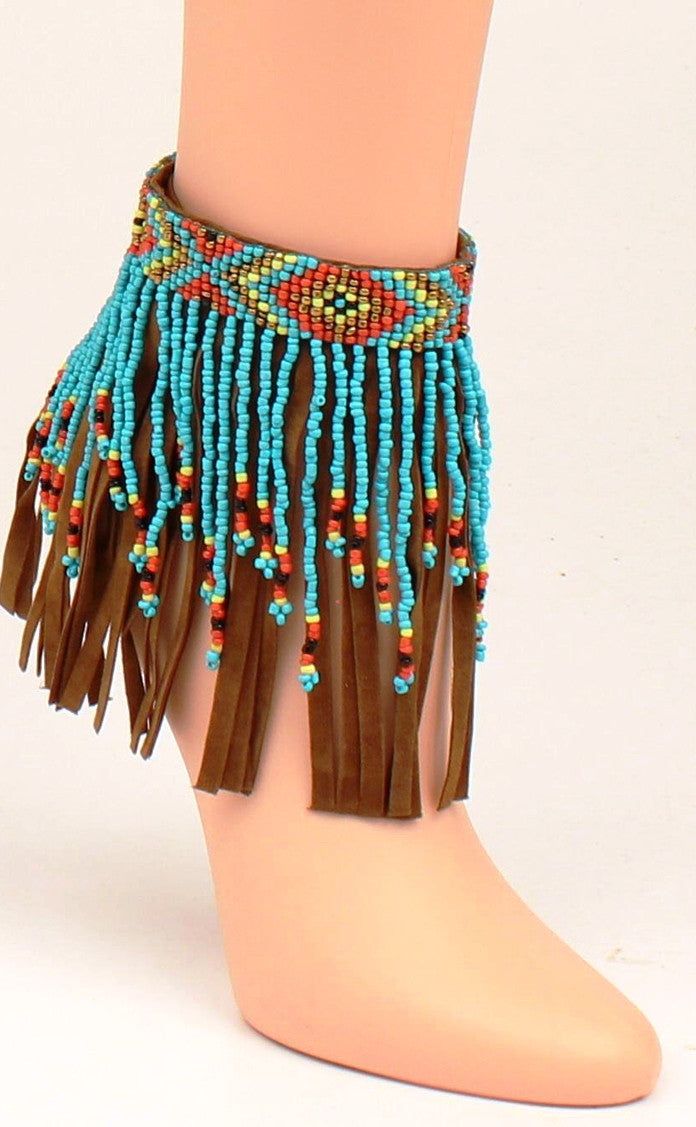 Boot Ankle Bracelet - Fringe Turquoise These ankle bracelets will certainly show your style. There is a tribal beaded band with beaded and leather fringe. Velcro closure. Brown Beaded Bracelet For Summer, Summer Festival Turquoise Beaded Bracelets, Summer Brown Beaded Bracelets, Blue Beaded Bohemian Anklets, Bohemian Blue Beaded Anklets, Turquoise Beaded Festival Anklets, Bohemian Festival Bracelets With Dangling Beads, Adjustable Beaded Bracelets With Tassels For Festivals, Adjustable Fringe Jewelry For Festivals