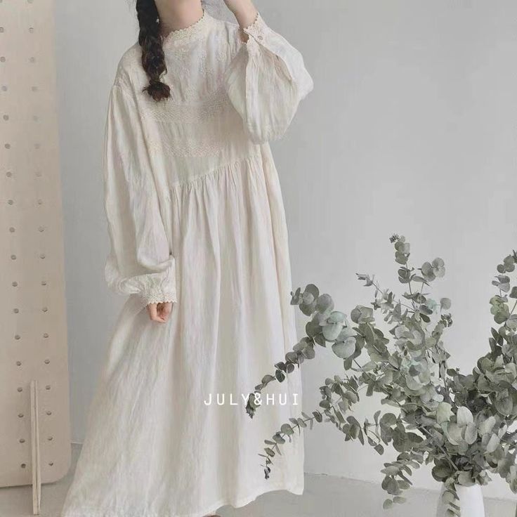 "This is a vintage type but new-made dress. Made of 100% cotton. Delicate lace embroidery flower decoration. Only white color and cream color available. Measures approximately: Bust: 55cm*2 (21.65\")*2 Length: 112cm (44.09\") Shoulder to Shoulder : 40cm (15.75\") Shoulder to Sleeve: 54cm (21.26\") ---------------------------------------- ❤ About Shipping Normally, it will takes 3-8 days to made the clothes after you submit the order. Free shipping for Worldwide countries. It takes about 20-30 da Vintage Long Sleeve Linen Dress For Spring, Long Sleeve Cotton Pastoral Dress, Beige Long Sleeve Linen Dress For Spring, Embroidered Long Sleeve Linen Dress For Spring, Beige Long Sleeve Cottagecore Dress, Feminine White Linen Dress, Cream Long Sleeve Linen Dress, White Long Sleeve Linen Dress For Spring, White Linen Cottagecore Dress