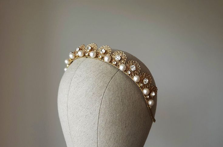 Gold crown with pearls. Bridal tiara. Wedding pearl crown ~MATERIALS~ -Czech glass white clear crystals -Austrian glass pearl -Gold filigree ~SIZE~ Height 1 inch (2,5 см) ~SHIPPING AND DELIVERY TIME~ This headpiece is ready to ship by 3-5 days The approximate time of shipment: - 10-16 days to Europe - 15-35 days to United States and other countries. ~IMPORTANT INFORMATION~ -Please allow as much time for shipping as possible before your important date ! I can't guarantee shipping time as its beyo Regal Structured Crown Wedding Headpiece, Gold Crown Design Headpiece With Pinched Crown, Regal Structured Crown Headpiece For Wedding, Regal Wedding Headpiece With Structured Crown, Regal Tall Crown Headpieces For Wedding, Elegant Teardrop Crown Wedding Headpiece, Elegant Tall Gold Crown, Regal Tall Crown For Wedding, Elegant Gold Crown With Pinched Shape