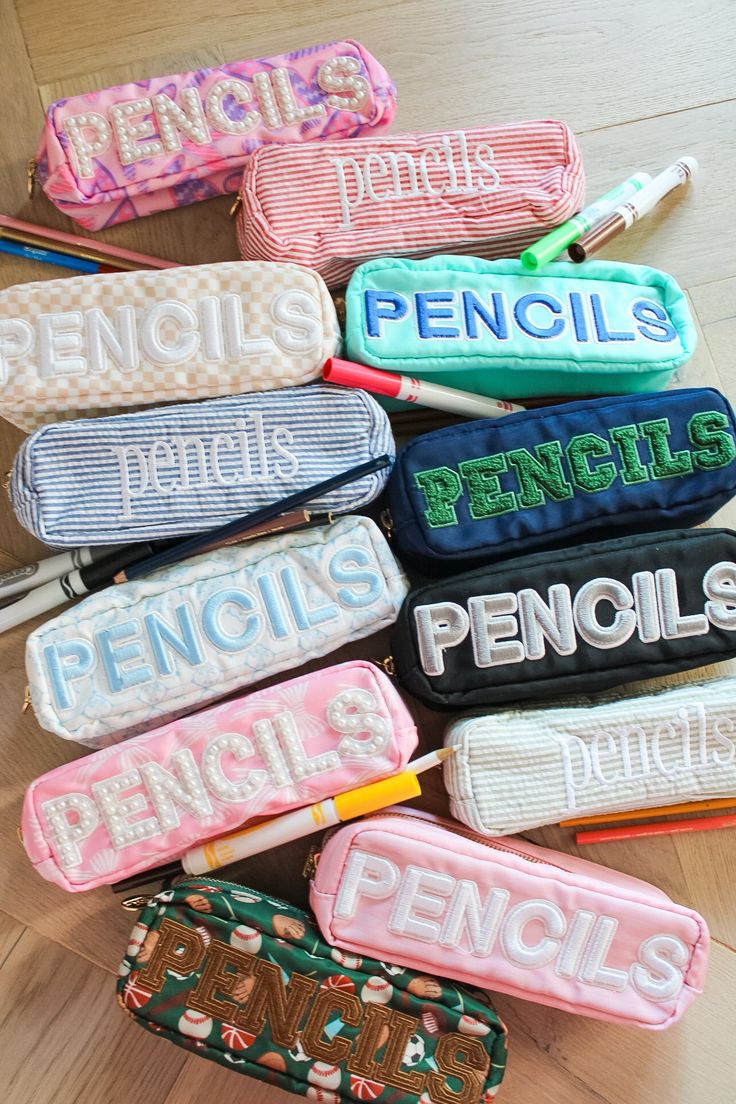 Back to school pencil pouches with the cutest prints and patches! Choose your favorite style and pair it with a matching lunchbox & backpack Ships immediately unless paired with a customized item! Dimensions: 7.9*2.5*2.7inch Trendy Student Pencil Case With Pen Holders, Trendy School Bags With Pen Slots, Trendy Student Stationery With Pen Slots, Cute Back To School Pen Holders Craft Supplies, Cute Pen Holders Craft Supplies For Back To School, Cute School Stationery With Pen Holders, Trendy School Stationery With Pen Slots, Cute Back To School Craft Supplies With Pen Holders, Trendy Stationery With Pen Slots For School