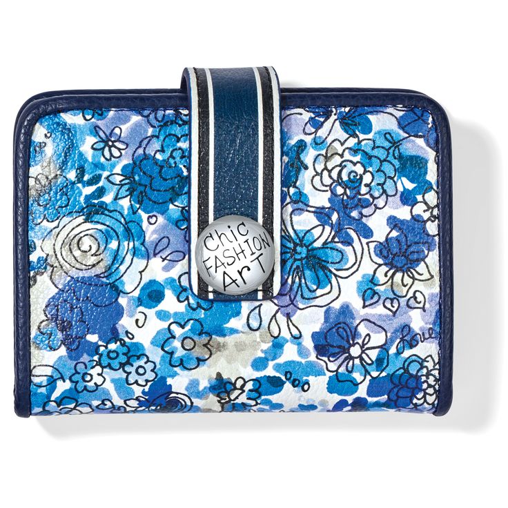 In wonderful shades of blue, highlighted with Italian navy blue leather, this wallet will match every pair of denim jeans you own, and compliment every other color in your closet. - Width: 4 1/4" - Height: 3 1/4" - Depth: 1/2" - Credit Card Slots: 7 - Interior Pockets: 1 - ID Window: Yes - Exterior Material: Leather - Closure: Snap - Exterior Pockets: 1 - Leather items: since this is a natural product, clean and condition regularly. - Silver Hardware: just wipe down with a dry 100% cotton cloth, Blue Leather Wallet With Rfid Blocking, Chic Blue Rectangular Wallet, Blue Leather Trifold Wallet For Travel, Trendy Blue Wallets With Interior Card Slots, Trendy Blue Wallets With Card Slots, Blue Bifold Wallet For Everyday Use, Blue Leather Trifold Wallet For Everyday Use, Everyday Blue Bifold Wallet, Casual Blue Bifold Wallet