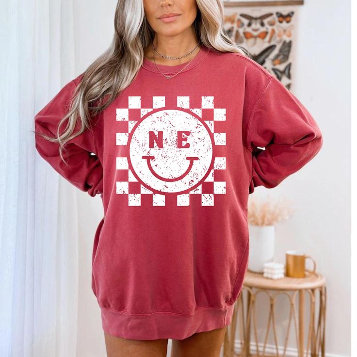 Show some state pride with this cute checkered design! + Made with Comfort Colors 100% cotton sweatshirts  + This item is currently fulfilled by our production partners Plaid Cotton Sweatshirt For Fall, Casual Plaid Long Sleeve Sweatshirt, Casual Long Sleeve Plaid Sweatshirt, Plaid Cotton Long Sleeve Sweatshirt, Plaid Cotton Tops With Letter Print, Casual Plaid Cotton Sweatshirt, Casual Cotton Plaid Sweatshirt, Smile Graphic, Checkered Design