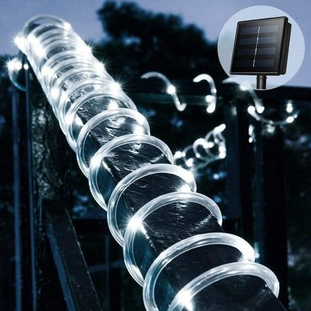 a solar powered light is attached to a metal rail with clear glass cups on it