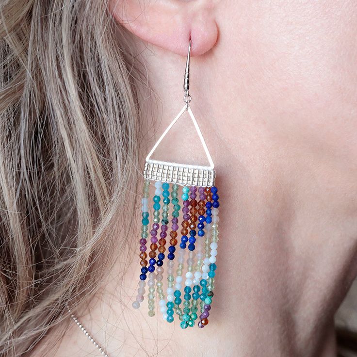 The perfect combination of elegant and fierce! These gorgeous fringe earring kits, designed by Jacquelyn, include 3 sparkly 15 inch strands of 2mm faceted gemstones from Dakota Stones in each kit. The metal triangle frames are the perfect base for these fringe earring designs that are so on trend, yet also timeless. Once completed, these earrings will measure approximately 3.75" long. Kit includes all materials for these earrings along with step-by-step instructions. Tools needed to complete thi Seed Bead Fringe Earrings, Bead Fringe Earrings, Fringe Earring, Bead Fringe, Chain Nose Pliers, Earring Kit, Earring Designs, Beautiful Lady, Beaded Fringe