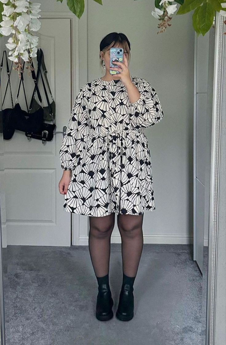 plus size alternative fashion | black and white edgy style | black and white patterned dress, tights, leather booties