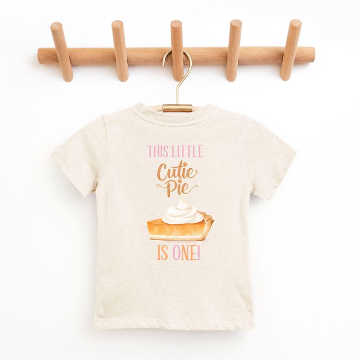 Cutie Pie Fall First Birthday shirt, Our Little Cutie Pie is Turning One shirt,  Pumpkin Pie Shirt, Pumpkin Birthday, Matching Family Shirts Welcome to Christi Creations! Here you will find that unique outfit for a special birthday! We have been in business over 14yrs here on Etsy and can assure you that you will receive 5 Star service! Thank you for supporting our small family business:) "Cutie Pie" birthday collection. Matching family members also available. If you are looking for a particular Cute Cotton T-shirt For Birthday, Cute Graphic Print Top For Birthdays, Cute Crew Neck T-shirt For Birthday, Casual Pre-shrunk T-shirt For First Birthday, Casual T-shirt With Funny Print For First Birthday, Cute Crew Neck Shirt For First Birthday, Cute Crew Neck Top For Birthday, Cute Birthday Top With Crew Neck, Cute Shirt With Graphic Print For First Birthday