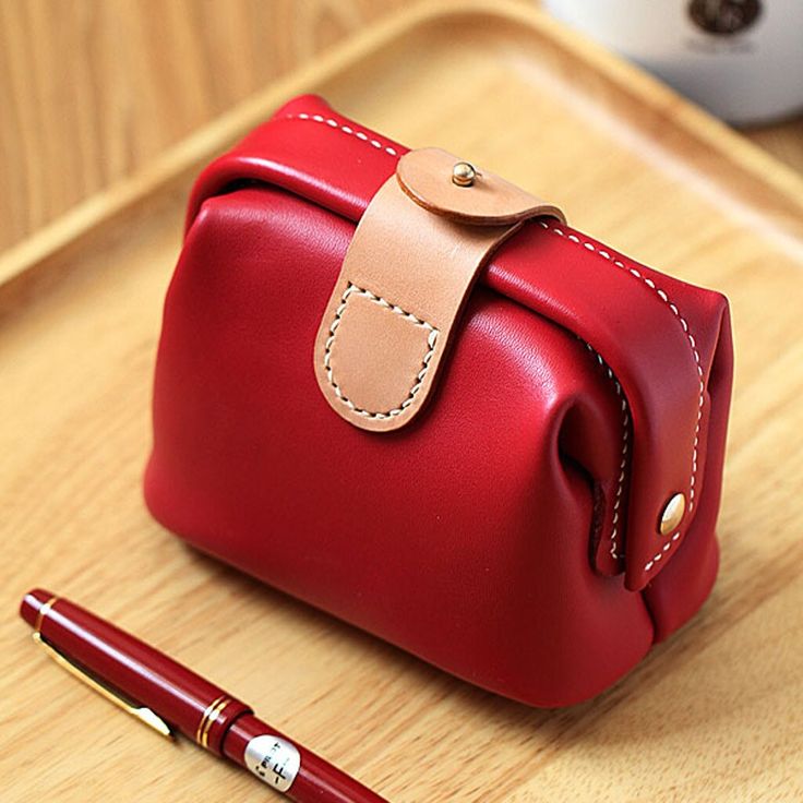 100% Hand-stitched claret-red Cow Leather Makeup bag Features: * Material: Vegetable Tanned Cowhide Leather * Size: 12.00cm*8.00cm*10.00cm * Color: Purplish Reddate Red(please let me know the color you want when you place the order) * 100% Handmade stitching If you have any questions or concerns, please don't hesitate to contact me. Red Everyday Bags With Card Slots, Red Shoulder Bag With Card Slots For Travel, Red Travel Shoulder Bag With Card Slots, Red Pouch With Card Slots For Daily Use, Red Coin Purse With Card Slots, Red Shoulder Bag With Card Slots For Everyday, Red Clutch Pouch For Gift, Red Pouch Clutch With Card Slots, Red Coin Purse With Removable Pouch As Gift