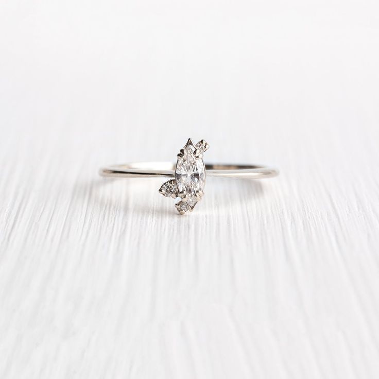 Diamond Ember Ring | Gold Engagement Ring | Melanie Casey Fine Jewelry Marquise Diamond White Sterling Silver Diamond Ring, Marquise Diamond White Sterling Silver Ring, Marquise Diamond White Diamond Ring For Promise, Marquise Diamond Ring With Prong Setting For Proposal, Marquise Cut White Gold Diamond Ring For Proposal, White Gold Marquise Cut Diamond Ring For Proposal, Diamond White Marquise Cut Diamond Ring For Promise, Sterling Silver Marquise Diamond Promise Ring, Marquise Sterling Silver Diamond Promise Ring