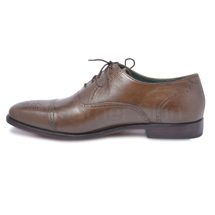 If you’ve been thinking which lace shoes to invest in, then look no further. These brown oxford capped toe brogue genuine leather shoes are more splendid than you ever imagined! The vamp covers the instep and toes, whereas the quarter wraps around the heel and joins the vamp in the middle of the foot. When it comes to versatility, elegance, and quality, you can never go wrong with these brown oxford capped toe brogue genuine leather shoes. Following are their features; Made of high-quality leather Capped toe with brogue design Oxford style handmade When it comes to style and quality, we guarantee you a great blend of both with this winning pair. Business Casual Cap Toe Oxfords With Rubber Sole, Business Casual Goodyear Welted Cap Toe Oxfords, Classic Cap Toe Lace-up Oxford Shoes, Business Brogue Cap Toe Derby, Timeless Cap Toe Leather Shoes For Derby, Classic Oxford Lace-up Cap Toe Shoes, Brogue Detailed Oxford Shoes For Derby With Cap Toe, Derby Oxford Shoes With Brogue Detailing And Cap Toe, Classic Cap Toe Lace-up Shoes With Rubber Sole