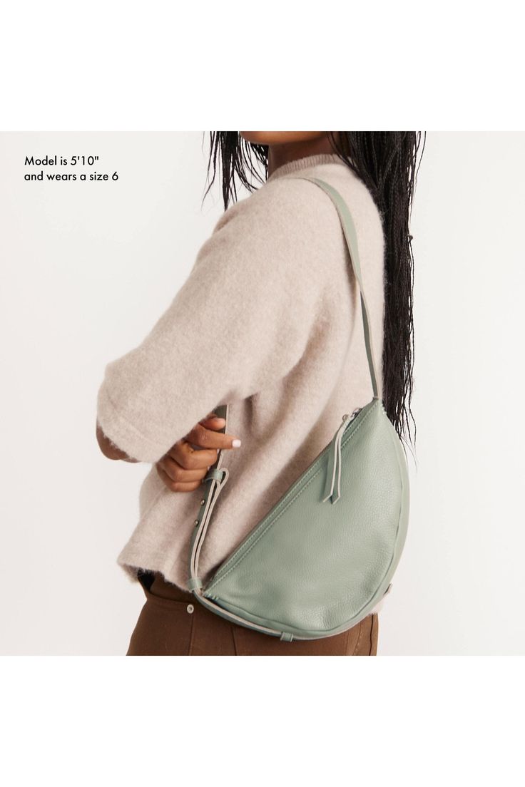 The Tess Sling combines the accessibility of a belt bag with the body-skimming comfort of a crossbody. Kitted with interior pockets and a long adjustable strap, this must-have bag is perfect for anyone who prioritizes straightforward, functional design. 6in L x 2.625in W x 11.5in H; Drop: 20 inches; Weight: 0.62 lb Interior: Repreve Lining Main zipper closure Adjustable Strap Interior contains a back zipper pocket and a slip pocket Adjustable leather sling strap Premium leather from a Leather Wo Fall On-the-go Belt Bag With Adjustable Strap, Casual Everyday Saddle Bag In Soft Leather, Casual Soft Leather Saddle Bag For Everyday, Casual Everyday Soft Leather Saddle Bag, Versatile Crossbody Shoulder Bag For Commuting, Functional Crossbody Hobo Bag With Adjustable Strap, Casual Everyday Saddle Bag With Adjustable Strap, Versatile Shoulder Bag With Adjustable Strap For Commuting, Casual Daily Saddle Bag With Adjustable Strap