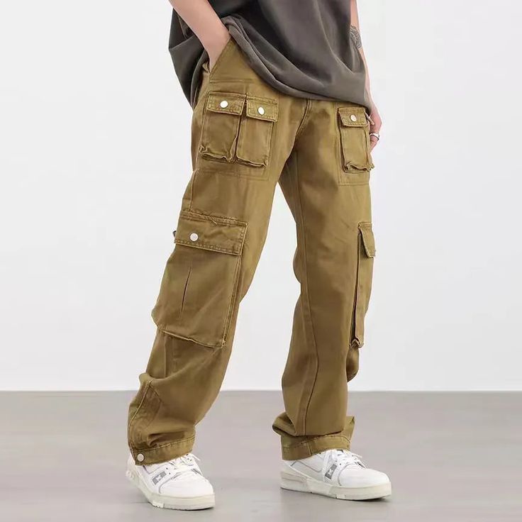 Cotton composition adds the denim touch for supremely comfortable Denim Cargo Pants, offering a loose fit, mid waist, and elastic waist closure DETAILSMaterial: CottonClosure Type: Elastic WaistFit Type: LooseWaist Type: Mid Denim Cargo Pants, Denim Cargo, Mens Cargo, Streetwear Y2k, Cargo Pants Men, Casual Trousers, Grey Khakis, Cargo Pants, Elastic Waist