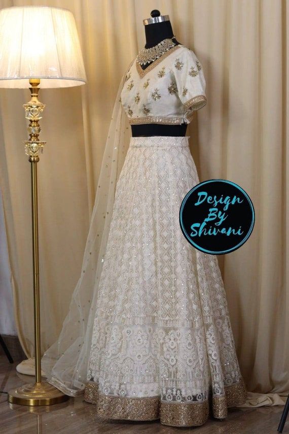 Check out this item in my Etsy shop https://www.etsy.com/listing/1279481661/white-chikankari-lehenga White Chikankari Lehenga, Ivory Lehenga, Embroidery Lehenga, Lehenga Bridesmaid, Chikankari Lehenga, Bridesmaid Lehenga, Anarkali Lehenga, Tulle Embroidery, Lehenga Skirt