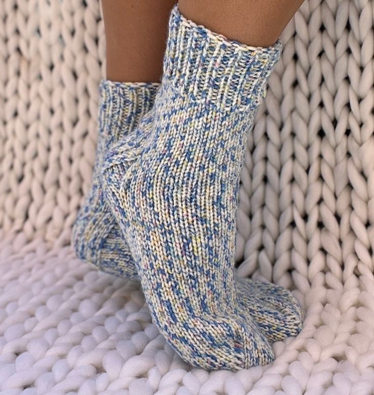 These cute wool slipper socks are so comfortable you'll want to wear them all year long.  Our warm winter socks provide a higher quality of craftsmanship, which means you can enjoy them year round, year after year and is a great Christmas gift. Never again will you leave the comfort of your warm bed to be awoken by an ice cold floor beneath your feet.  Cuddling up with a blanket in front of the television will no longer be a choice of warm feet or warm shoulders.  You'll no longer need a space h Comfortable Hand Knitted Winter Socks, Cozy Warm Socks, Comfortable Blue Socks For Winter, Comfortable Blue Winter Socks, Handmade Cozy Winter Socks, Cozy Handmade Socks For Stocking Stuffers, Warm Cozy Socks, Cozy Warm Blue Socks, Handmade Cozy Socks For Fall