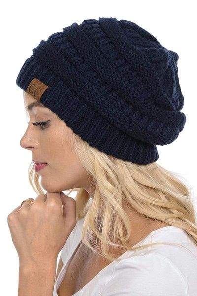 Out ultra-comfy CC hats come in a variety of colors. Style: Knit Beanie Material: 100% Acrylic Size: One Size Fits Most Measurements: 22-3/8" (57 cm.), Size 7-1/8 | Flat measurements: 11" x 9" An oversized slouchy cable knit beanie with ridges and a cuffed detail. Available in an array of solid colors. Black hat does NOT come with pom pom Casual Soft Knit Hat, Casual Super Soft One Size Hat, Comfortable Beanie Hats For Fall, Lightweight Comfortable Hat One Size Fits Most, Comfortable Beanie For Fall, Comfortable Slouchy Winter Hat, Comfortable Lightweight Hat, Casual One-size Hats For Cold Weather, Super Soft Casual Beanie One Size