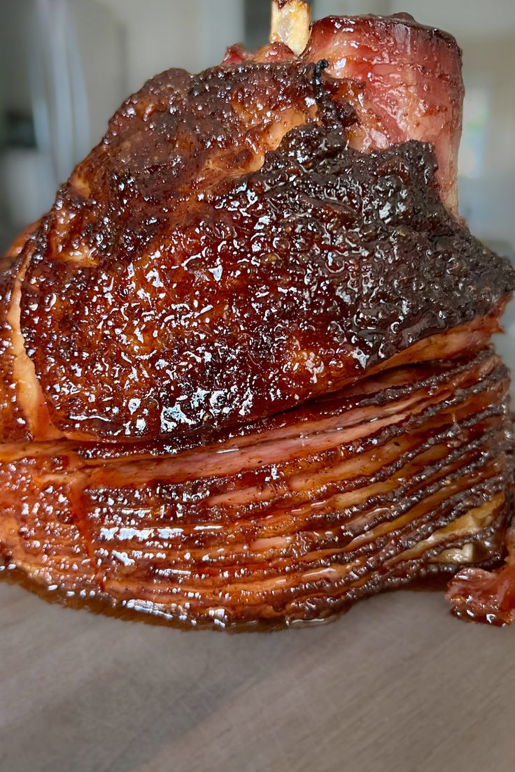 a pile of bacon sitting on top of a wooden table