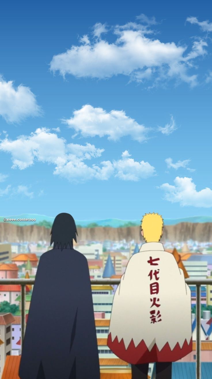 two people looking out over a city with clouds in the sky