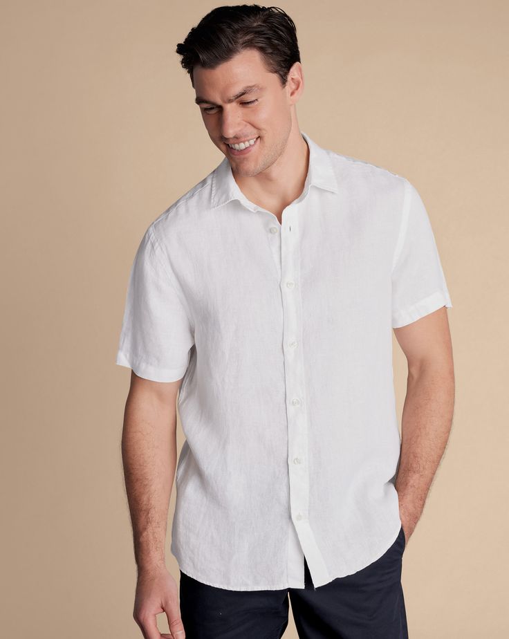 100% linen, Available in classic and slim fit, Classic Collar, Short sleeve, Classic and slim fit: back pleats, Machine washable - Pure Linen Short Sleeve Shirt - White - Pure Linen Short Sleeve Shirt - White | Men's Charles Tyrwhitt Pure Short Sleeve Casual Shirt - White Single Cuff Size Large Linen Classic Linen Tops With Spread Collar, Classic Linen Top With Spread Collar, Classic Unstructured Linen Tops, Classic Slim Fit Linen Top, Classic Linen Slim Fit Tops, Classic Solid Linen Shirt, Fitted Linen Shirt With Spread Collar, Fitted Classic Linen Shirt, Slim Fit Linen Top With Spread Collar