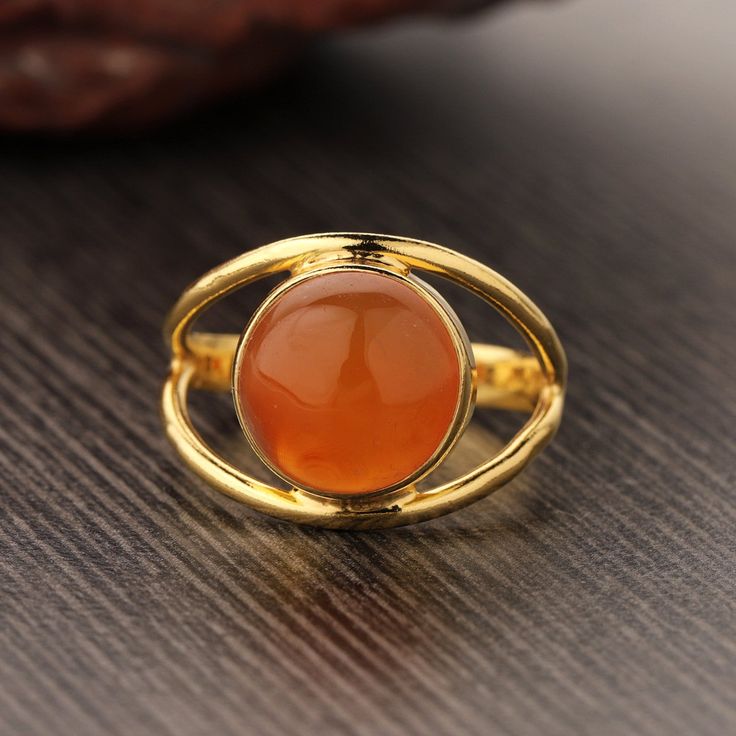 18K Gold Plated on 925 Sterling Silver. Metal : Solid Sterling Silver with 925 Stamp. Stone - Natural Carnelian  Ring Weight - 3.3 gm. Stone Size - 10mm round Fine Jewelry Gold Moonstone Ring, Gold Moonstone Round Ring Fine Jewelry, Yellow Gold Cabochon Opal Ring, Gold Moonstone Ring In 14k Gold, Formal Polished Opal Ring, Polished Moonstone Fine Jewelry Ring, Polished Moonstone Ring In Fine Jewelry Style, Polished Round Moonstone Ring In Fine Jewelry Style, Gold Opal Ring Fine Jewelry