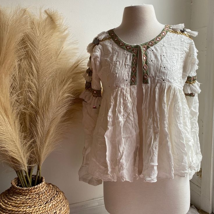 Questions? Comment Below! Bohemian Embroidered Top For Party, Chic Embellished Summer Blouse, Chic Cotton Blouse For Festivals, Chic Embellished Blouse For Summer, Bohemian Fall Top With Tassels, Bohemian Tops With Tassels For Fall, Bohemian Top With Tassels For Fall, Chic Embellished Blouse For Festive Occasions, Fitted Embellished Tops For Spring