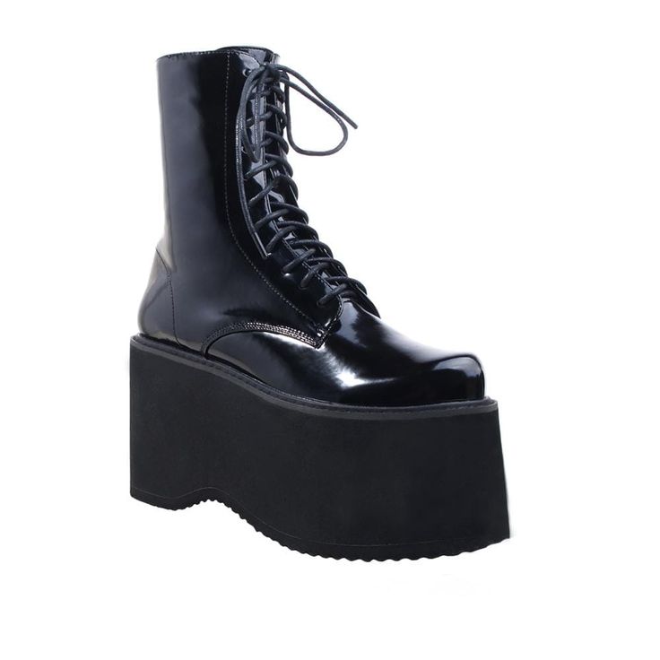 Vegan leather upper with man made sole Side zipper closure Platform measures approx. 4.25" H Imported High Heel Chunky Platform Martin Boots For Streetwear, Chunky Platform High Heel Martin Boots For Streetwear, High Ankle Lace-up Boots With Platform, High Heel Martin Boots With Chunky Platform For Streetwear, Platform Ankle-high Heeled Boots In Polyurethane, Fall Platform Polyurethane Boots, Polyurethane Platform Ankle-high Heeled Boots, Fall Platform Boots In Polyurethane, Edgy Synthetic Platform Heeled Boots