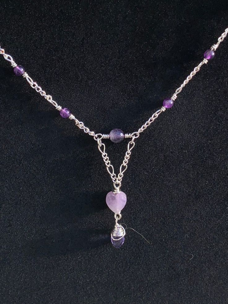 Handmade amethyst necklace with hanging Czech crystal teardrop Made with all silver plated components necklace can be made with a plain chain instead of beaded-so would have the pendant at the center with a plain silver chain for 15$ instead of 25$ Purple Teardrop Pendant Necklace For Jewelry Making, Purple Teardrop Pendant For Jewelry Making, Bohemian Purple Necklace With Heart Beads, Silver Heart Beads Teardrop Jewelry, Silver Beaded Teardrop Crystal Necklace, Silver Dangle Necklace With Heart Beads, Silver Teardrop Jewelry With Heart Beads, Silver Pendant Crystal Necklace With Beaded Chain, Silver Teardrop Pendant Beaded Necklace For Gift