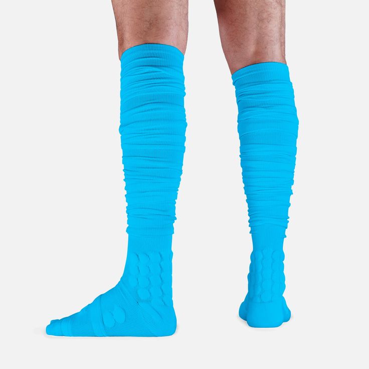 Choose padded socks designed to protect your feet and legs for the long haul with your completing tryouts or in a game. The best padded socks from SLEEFS will provide complete support to your feet with extra padding, designed to protect sensitive areas like your ankles. With padded football socks, it is less likely that you will sustain a significant injury during a fall. These padded running socks are also designed to keep levels of moisture under control. Stop sweat or water soaking your feet with sports gear made from moisture wicking material. The nylon/spandex blend will guarantee that your feet will stay dry for the duration of a game. This added level of comfort will ensure you can focus on reaching your maximum potential. Padded ankle socks from SLEEFs are suitable for a wide range Sports Stretch Hosiery, Sporty Stretch Hosiery For Sports, Blue Breathable Running Socks, Sporty Blue Running Socks, Blue Non-slip Sporty Socks, Blue Functional Running Socks, Sporty Non-slip Blue Socks, Functional Blue Socks For Training, Blue Non-slip Stretch Socks