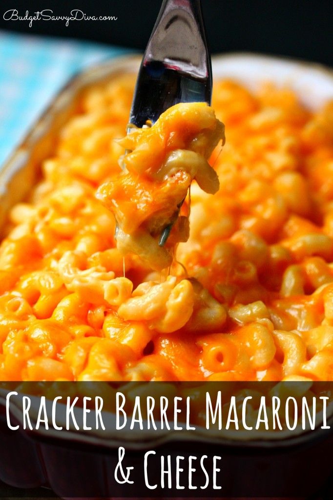 a spoon full of macaroni and cheese with the words cracker barrel macaroni and cheese