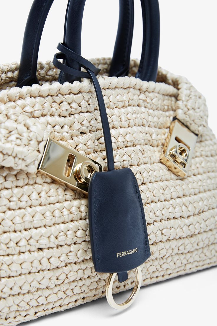 Beige raffia mini bag from Ferragamo. The Hug mini bag is made of raffia, featuring gold-toned "Gancini" buckles and studs at the base, complete with two leather top handles along with a removable leather strap. Measurements: L24 x H15 x W10cmMade in Italy Mini Crochet Bag, The Hug, Mini Crochet, Leather Top, Crochet Bag, Mini Bag, Leather Straps, Gold Tones, Handles