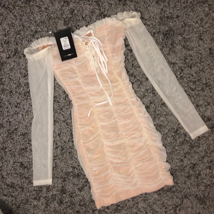 Size: X-Small Nude/ White Fits Very Tight Light Stretch Deep V-Neckline Bottom Of Dress Hits About Mid-Thigh Never Worn ! Sheer Mini Dress For Brunch, White Sheer V-neck Mini Dress, Off-shoulder Sheer Mini Dress For Spring, Sheer Off-shoulder Mini Dress For Spring, Spring Cream Mini Bodycon Dress, White Sheer Bodycon Summer Dress, Chic White Sheer Bodycon Dress, Spring Sheer Bodycon Dress For Date Night, Sheer Bodycon Dress For Spring Date Night