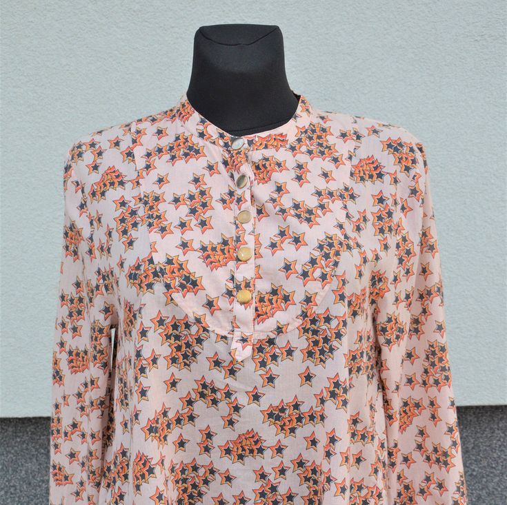 "Women's S blouse peasant. Women's cotton shirt. Vintage women blouse. Loose women boho blouse. Women's fall blouse. Long sleeves shirt. Peasant folk style. Vintage Europe clothes. Vintage shirt.  Very beautiful vintage blouse. Has producer label. Very soft fabric.  Has size label: EUR - 36, UK - 8, S Small. Please check the measurements: Length - 24.4\" (62 cm) (in the back middle) Bust 1/2 - 20.47'' (52 cm) (when laid flat) Bottom 1/2 - 27.16'' (69 cm) (when laid flat) Sleeves: 22.83\" (58 cm) Shoulders: 15.94\" (40.5 cm) MATERIAL: 100 %  cotton (has composition label) Good vintage condition. If you have any questions, please let me know, i will be more than happy to help." Floral Print Long Sleeve Festival Top, Long Sleeve Boho Print Blouse For Fall, Fall Boho Print Long Sleeve Blouse, Folk Style Long Sleeve Tops For Spring, Vintage Long Sleeve Tops With Boho Print, Casual Long Sleeve Blouse With Boho Print, Casual Long Sleeve Boho Print Blouse, Spring Folk Blouse With Boho Print, Floral Print Long Sleeve Peasant Top With Relaxed Fit