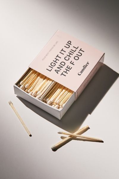 matches and matchsticks on a white surface