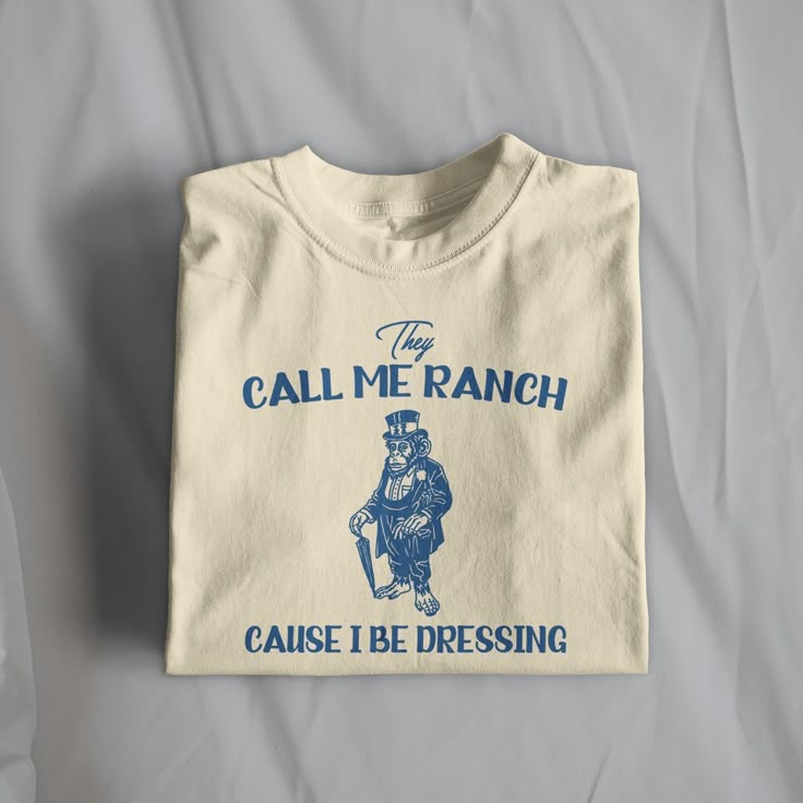 They Call Me Ranch T-Shirt, Weird Shirt, Meme T-Shirt, Unhinged T-Shirt, Meme Shirt, Funny Shirt, Pyjama T-Shirt, Monkey T-Shirt, Unisex WORLDWIDE SHIPPING FREE UK SHIPPING FREE US SHIPPING Silly and trendy clothing made for you! - Unisex Fit - 100% Cotton - Classic Fit - Tear-away Label - Runs True To Size Please see the size chart on slide 3 for more details. Each item is made to order and shipped in 1-5 days. Please don't hesitate to reach out if you have any questions! Thanks, UnhingedDoodle Funny Shirt Aesthetic, Funny Unhinged Shirts, Unhinged Tshirts, Funny Shirts Women Hilarious, Funky T Shirts, Cursed Shirts, Funny Shirt Quotes, Goofy Shirt, Funky Tees