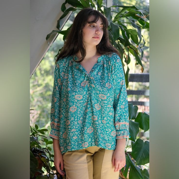 V-Neck Blouse With Covered Buttons. Full Sleeves With Button Closure At Wrist. Slightly Pleated Under Collar To Add Body. Xs Fits Most 0-2 | S Fits Most 4-6 | M Fits Most 8-10 | L Fits Most 10-14 Model Is 5'8" Wearing Size Small 100% Silk Hand Wash In Cold Water And Line Dry. Dry Cleaning Also Recommended. Nwt From My Recently Closed Boutique Green Relaxed Fit V-neck Blouse, Casual Turquoise V-neck Blouse, Casual Blouse With Notched Neckline, Summer Blue Viscose Blouse, Blue Viscose Summer Blouse, Blue Viscose Blouse For Summer, Blue Bohemian Blouse With Split Neck, Turquoise Cotton Blouse, Summer Blue Split Neck Blouse