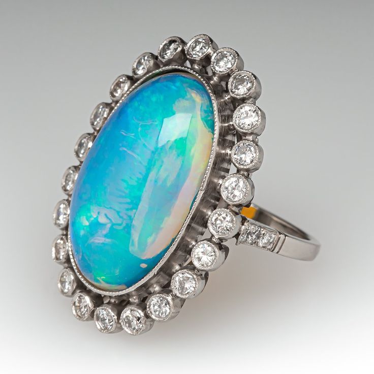 an opalite and diamond ring, by van cleef in the early 20th century