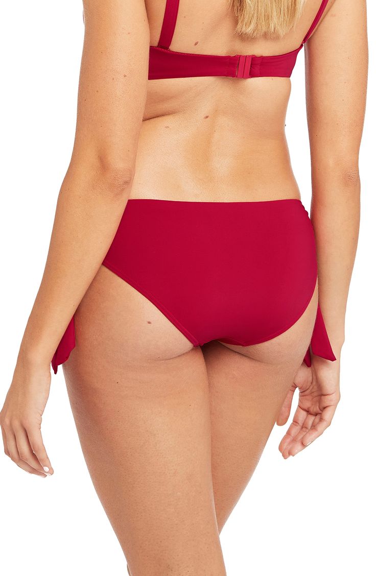 Drapey ties tether the sides of these shapely swim bottoms designed with airy ring details. Moderate back coverage Partially lined 85% recycled polyester, 15% elastane Hand wash, dry flat Imported This product meets Nordstrom Sustainably Sourced Materials criteria: contains at least 50% sustainably sourced materials Beach Nylon Bottoms With Side Ties, Red Tie-side Swimming Bottoms, Red Tie-side Pool Bottoms, Red Tie-side Bottom Beachwear, Nylon Tankini With Tie-side Bottom, Red Swimwear For Pool, Red Elastane Swimwear For Pool, Red Tie-back Swimwear For Pool, Red Tie Back Swimwear For Pool