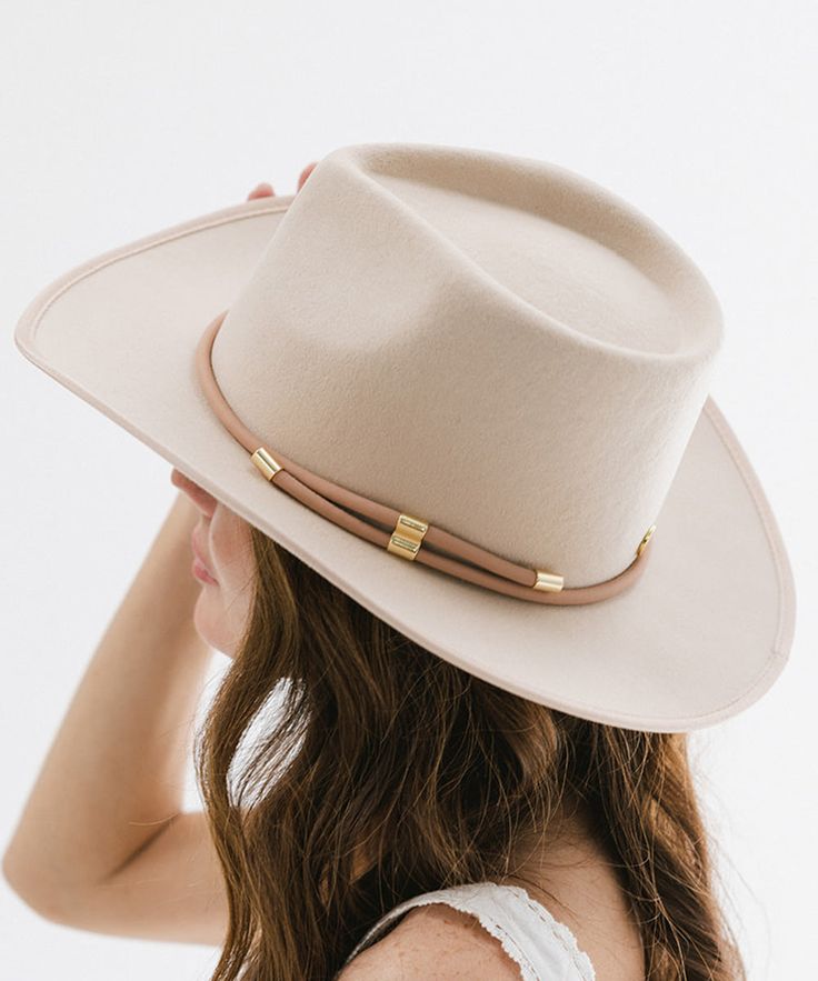 Everything you need in a hat band - adjustable, removable + confidence-boosting. A minimalist vegan leather hat wrap band featuring gold detailing to naturally elevate any look. Gold Fedora With Adjustable Short Brim, Adjustable Gold Fedora With Short Brim, Adjustable Brimmed Gold Fedora, Adjustable Gold Brimmed Fedora, Adjustable Gold Wide Brim Fedora, Elegant Adjustable Gold Fedora, Trendy Adjustable Fedora For Everyday, Trendy Adjustable Gold Hats, Spring Everyday Adjustable Felt Hat