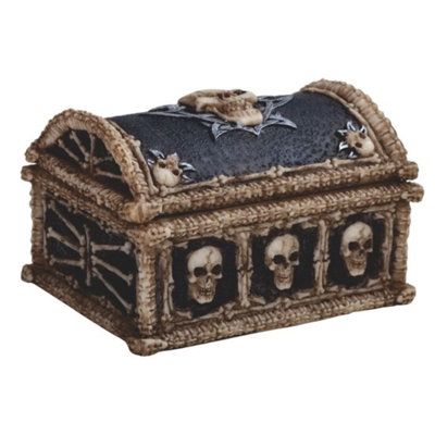 a decorative box with skulls and bones on it