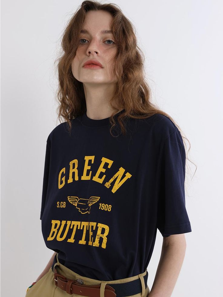 This is a modern and comfortable top by GREENBUTTER that is made out of high quality and sturdy fabric. With unique design detail and trendy mood, you can style it for your casual and young daily outfit.- Bio washed cotton fabric- Silky processed cotton with soft touch- Graphic print on the front and back Urban Style Text Print Top For Spring, Navy Cotton T-shirt For Everyday, Urban Cotton Top For Fall, Urban Style Cotton Top For Fall, Urban Cotton T-shirt For Fall, Urban Cotton Tops With Screen Print, Everyday Graphic Print Cotton Jersey Tops, Everyday Cotton Jersey Top With Graphic Print, Navy Graphic Tee With Letter Print