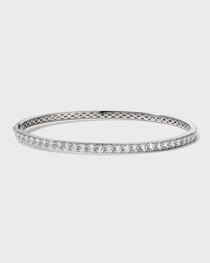 Diamond fashion bangle from Memoire..Polished 18-karat white gold hardware..26 round-cut, prong-set G-H/SI diamonds..Hinged opening with fold-over clasp..1.97 total diamond carat weight. Diamond Bangles Bracelet, Bangles Style, Diamond Carat, Diamond Bangle, Diamond Fashion, Free Jewelry, White Gold Diamonds, Prong Setting, Gold Hardware