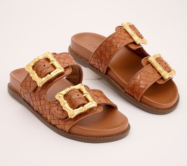 Don't leave these leather slides behind when you take off on weekend getaways and week-long vacations. Bold buckles brandish the woven design so you stay stylish anywhere you go during those easy breezy summer days. From Schutz. Casual Sandals With Intrecciato Weave For Vacation, Casual Intrecciato Weave Sandals For Vacation, Luxury Sandals With Buckle Closure For Vacation, Leather Sandals With Intrecciato Weave For Vacation, Trendy Woven Leather Sandals, Leather Slides With Buckle For Vacation, Leather Slides With Buckle Closure For Vacation, Beach Slides With Tang Buckle And Round Toe, Casual Sandals With Tang Buckle For Vacation