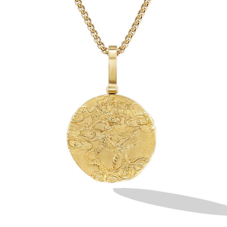 David Yurman amulets are an ode to individuality, representing a range of symbols, talismans, and motifs. The collectable designs can be worn alone on a chain or paired together to create meaningful expressions of personal style. 18-karat yellow gold Amulet, 30.9 x 20mm Please note: amulet only; chain sold separately Shown with: Box Chain Red envelope embossed with our signature gold Cable motif. Yours with a purchase of a limited edition dragon amulet. US only Style #D35003M88 Luxury Gold-tone Amulet Jewelry, 14k Gold Medallion Amulet Jewelry, Symbolic Brass Jewelry With Coin Pendant, 22k Yellow Gold Medallion Jewelry, Symbolic Gold Jewelry With Large Pendant, Luxury Brass Jewelry With Coin Pendant, Brass Amulet Jewelry With Coin Pendant, Gold Amulet Jewelry With Polished Finish, Brass Amulet With Coin Pendant