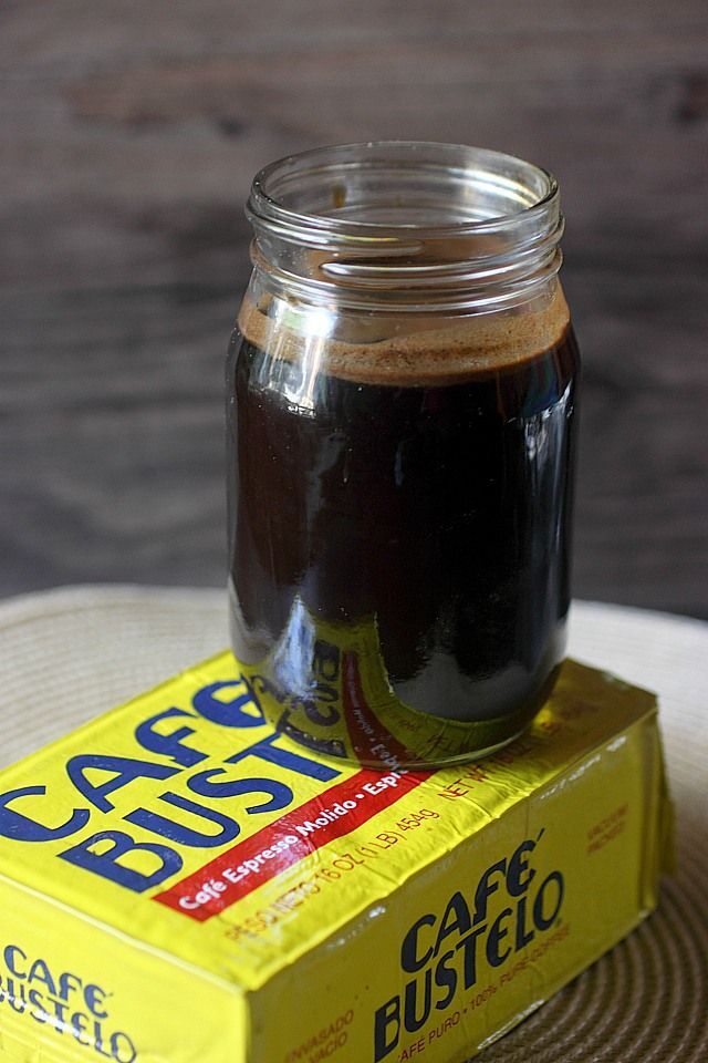 a jar of coffee sitting on top of a box