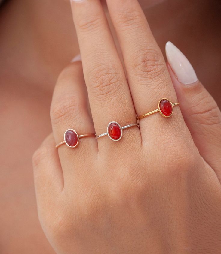 "Handmade Ring 14k Solid Gold Carnelian Ring, Sterling Silver 925 Carnelian Ring, Carnelian Ring, Silver Ring, Christmas Gift, Tiny Carnelian Ring * Material: High Quality 925 Sterling Silver * Finished Color: Sterling Silver, yellow and rose gold filled H O W ∙ T O ∙ O R D E R - Select options from the drop-down menu - Add to cart and proceed to checkout GEMSTONE DETAILS Stone: Carnelian Size:6x6 mm Shape: Round Cut: Cabochon The silver ring in the photo is the one that you will be purchasing. Oval Red Enamel Ring For Gift, Red Oval Enamel Ring For Gift, Carnelian Ruby Ring With Oval Cabochon For Gift, Red Carnelian Oval Cabochon Ruby Ring, Carnelian Oval Cabochon Ring As Gift, Oval Gemstone Enamel Ring As Gift, Carnelian Oval Cabochon Ring For Gift, Oval Enamel Gemstone Ring As Gift, Oval Carnelian Moonstone Ring For Anniversary