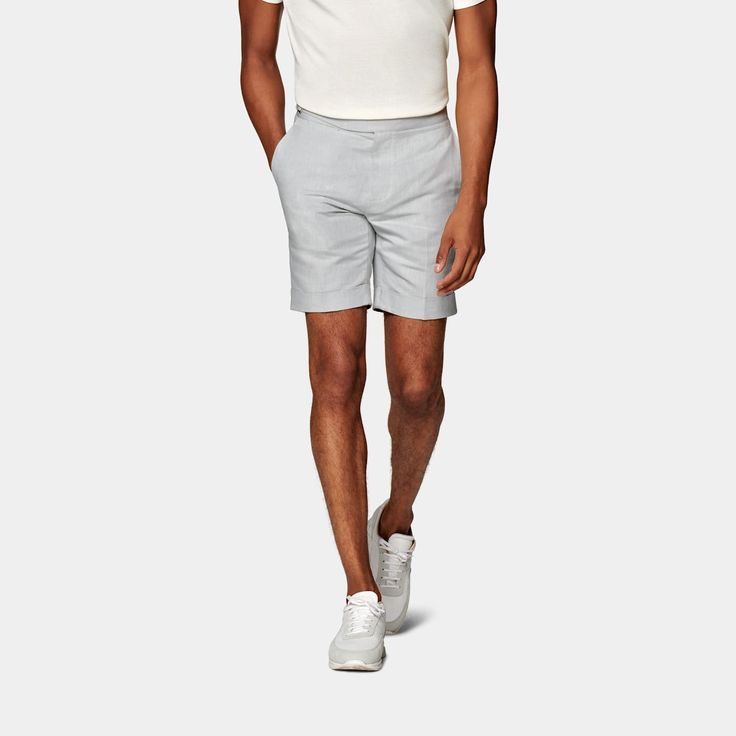 This relaxed take on our Fellini fit brings a summer-ready pair of shorts to your smart casual wardrobe. Tailored slim to mid-thigh, it features the signature Gurkha-style closure. Slim Fit Summer Bottoms Short Length, Spring Cotton Bermuda Shorts For Business Casual, Business Casual Bermuda Cotton Shorts, Slim Fit Summer Shorts, Slim Fit Bottoms For Business Casual Summer, Business Casual Cotton Shorts With Short Legs, Slim Fit Bottoms For Summer Business Casual, Cotton Shorts For Business Casual, Summer Business Casual Slim Fit Bottoms